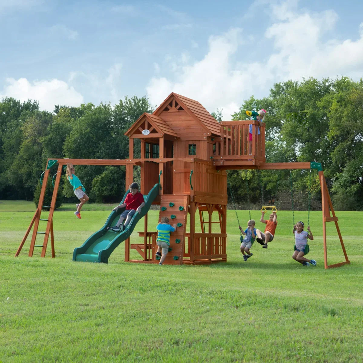 Backyard Discovery Skyfort II Cedar Wood Playset Swing Set with Raised Clubhouse Wave Slide Monkey Bars and Rock Climbing Wall - Image 2